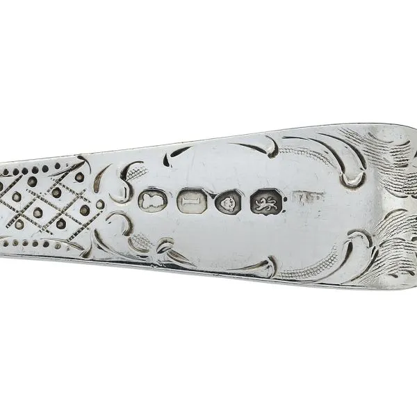 A matched pair of George III Scottish silver berry spoons